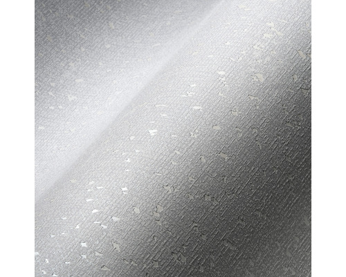 Close-up van een grijs behang met onregelmatige textuur