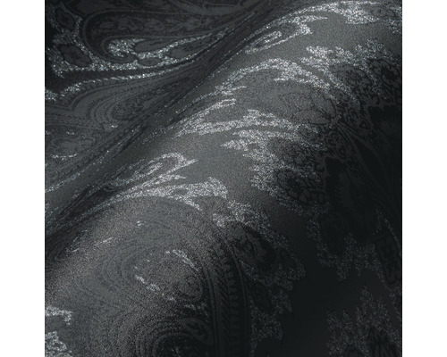 Close-up van een zwart behang met paisley patroon