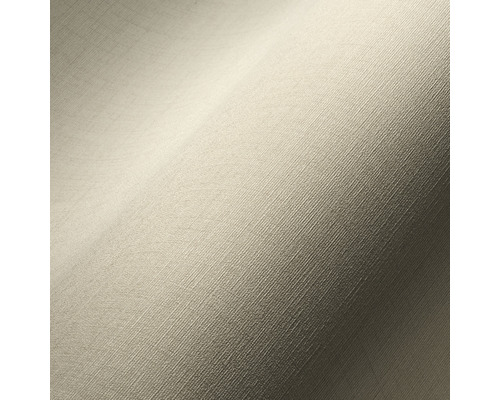 Close-up van een beige structuurbehang.