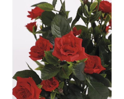 Decoratieve kunstmatige rozen met groene bladeren