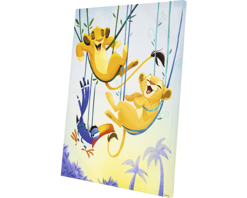 Canvas schilderij met spelende leeuwenwelpen en een vogel