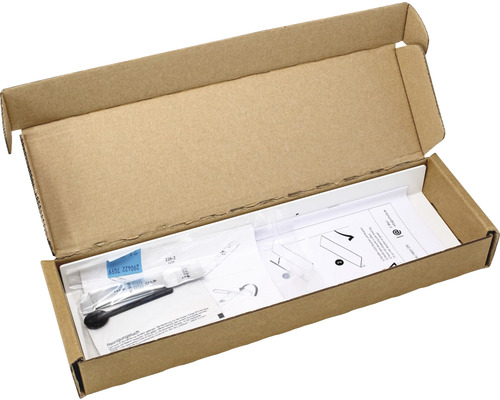 Open kartonnen doos met reinigingsset en instructies