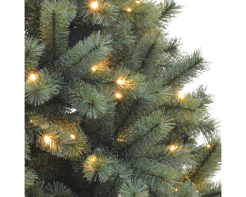 Detailopname van een kunstkerstboom met verlichting