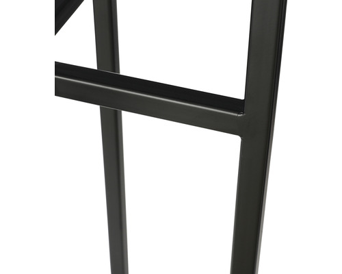 Detailopname van het metalen frame van een meubelstuk