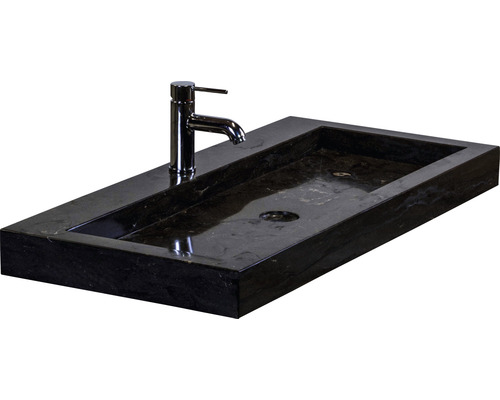 Natuurstenen wastafel met kraan