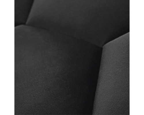 Close-up van een zwart meubelstuk met stoffen bekleding