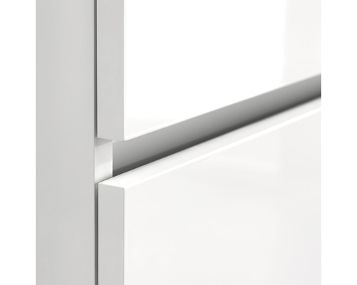 Gedetailleerde opname van witte meubelfronten van lades