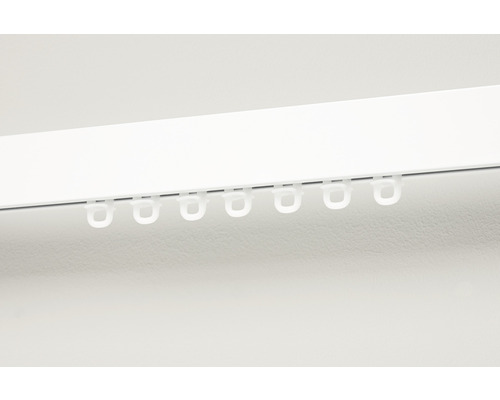 Gordijnrail met glijders voor gordijnbevestiging