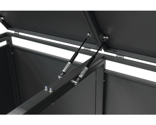 Detailopname van een open opbergbox met gasveren