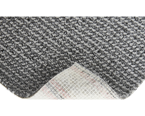 Close-up van een grijs tapijt met textielrug