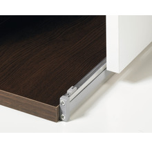 Detailopname van een ladegeleider op een houten lade