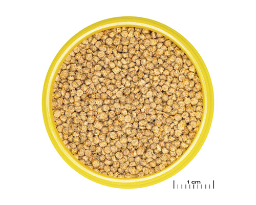 Visvoer granulaat in gele container