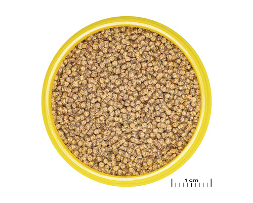 Visvoer pellets in gele schaal