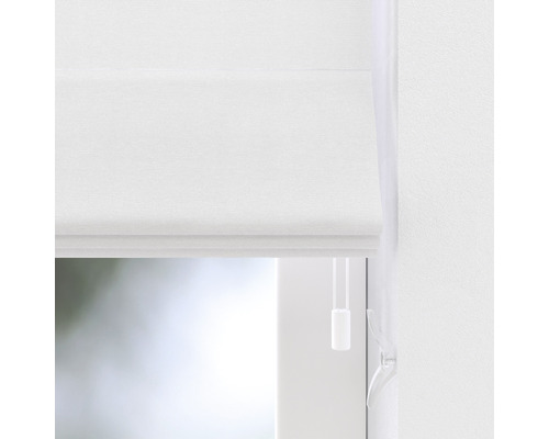 Wit vouwgordijn op het raam