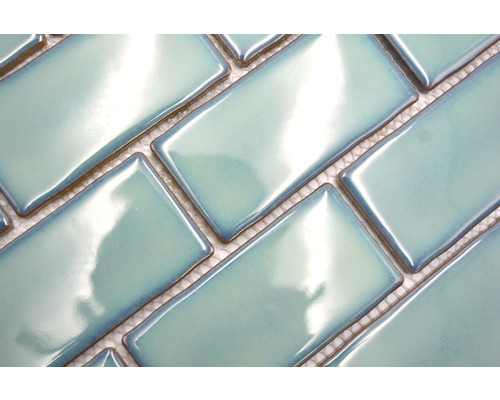 Rechthoekige keramische tegels in visgraatmotief