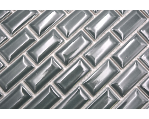 Mozaïektegels in visgraatpatroon