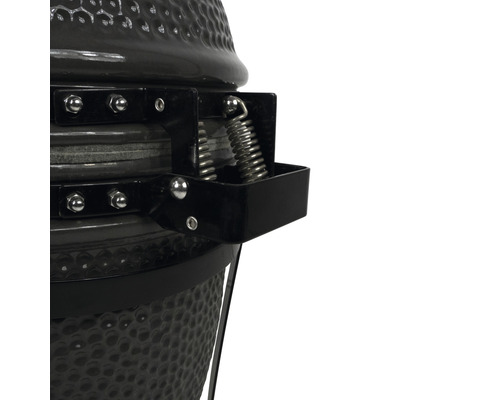Detailaanzicht van een kamado barbecue met vering