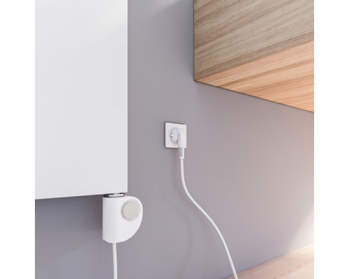 Elektrische wandverwarming met thermostaat en stekker in stopcontact