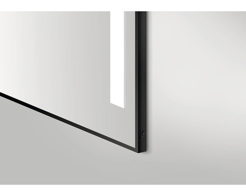 Detailopname van een spiegel met frame en ledverlichting