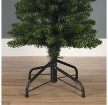 Gedetailleerde opname van een kunstmatige kerstboom met metalen voet.
