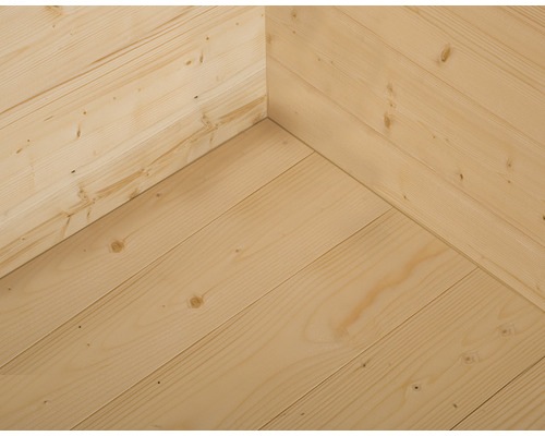 Hoekweergave met houten wand en houten vloer