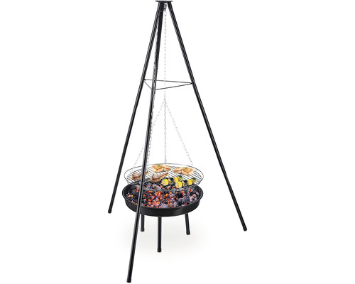 Driepootbarbecue met voedsel op de grill