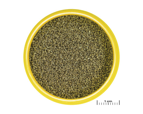 Visvoergranulaat in gele container