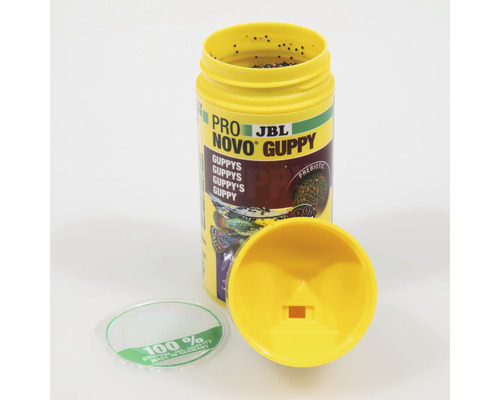 JBL Novo Guppy visvoer in gele container met geopende deksel