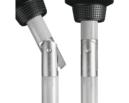 Detailopname van twee verstelbare lampenmasten met kantelgewricht