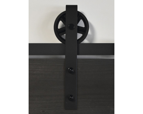 Detailopname van een schuifdeur beslag met wielophanging