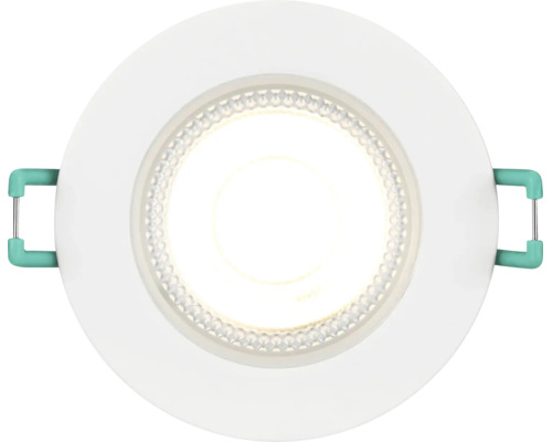 Ronde LED inbouwspot met witte buitenring en bevestigingsveren aan de zijkant.