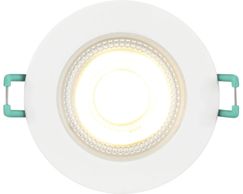 Ronde LED inbouwspot met wit frame en ingeschakeld warm wit licht.