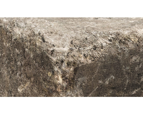 Close-up van een betonnen stoeprand