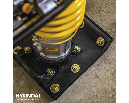 Detailopname van een trilplaat met gele balg en zwarte bodemplaat