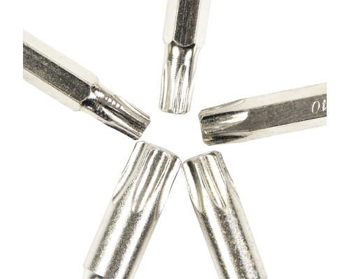 Meerdere metalen Torx-bits liggen in een cirkelvormige opstelling