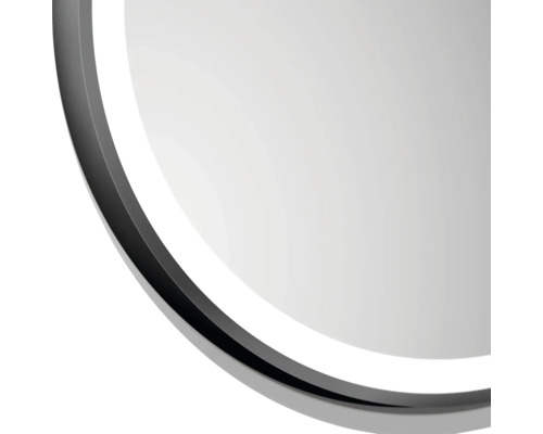 Detailopname van een ronde spiegel met frame