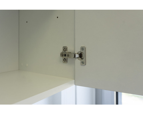 Binnenkant keukenkast met gemonteerd meubelscharnier