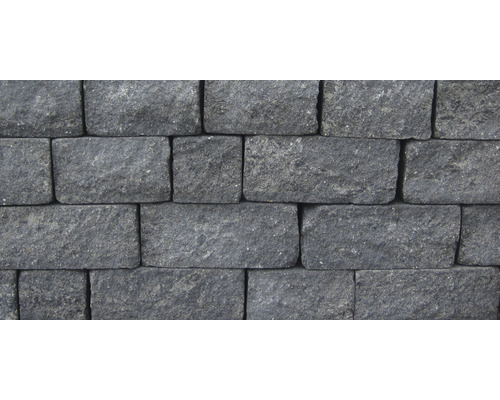 Muur van donkere straatstenen