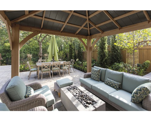 Tuinpaviljoen met eettafel, stoelen, loungemeubels en vuurplaats