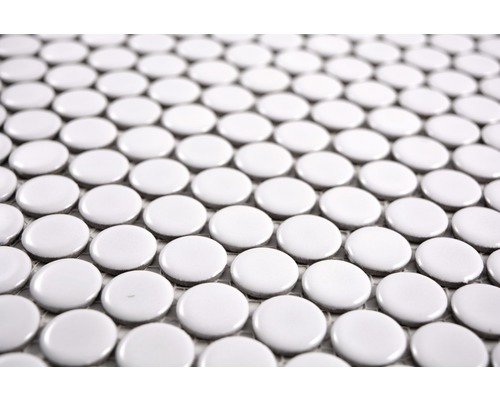 Gedetailleerde opname van ronde mozaïektegels