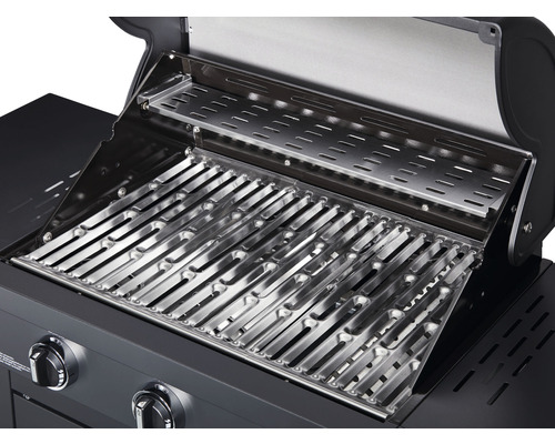 Geopende gasbarbecue met metalen grillrooster en warmhoudrek