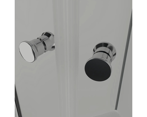 Detailopname van twee deurknoppen op een douchecabine