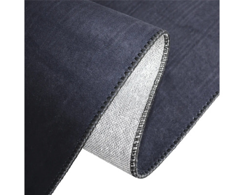 Detailopname van een tapijt met omgeslagen rand