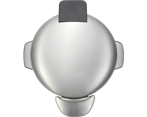 Rond, zilverkleurig wafelijzer van bovenaf