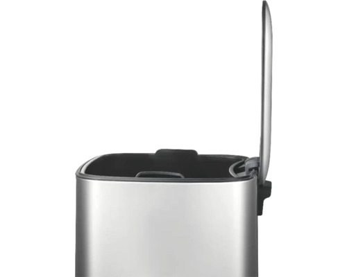 Geopende metalen pedaalemmer