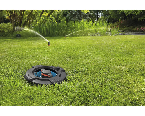 Besproeid gazon met verzonken vierkante sproeier