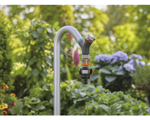 Tuinslangaansluiting met kraan in de tuin