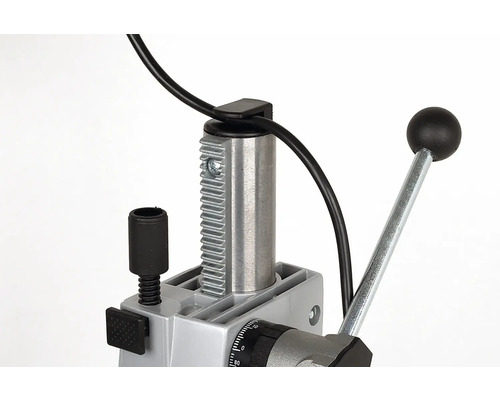 Detailweergave van een boormachine met tandheugel en bedieningshendel