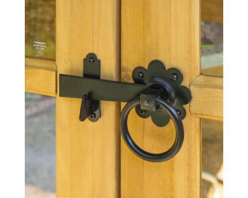 Schuifgrendel met ringgreep op een houten deur