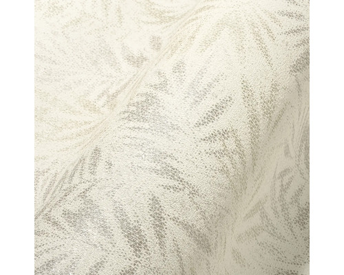 Close-up van een lichtgekleurd behang met abstract patroon.